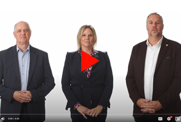 photo of Bill Madder, Kathy Amess and Adam Miller with video "PLAY" button overlaid