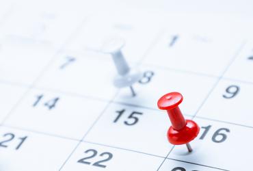 Calendar with push pins